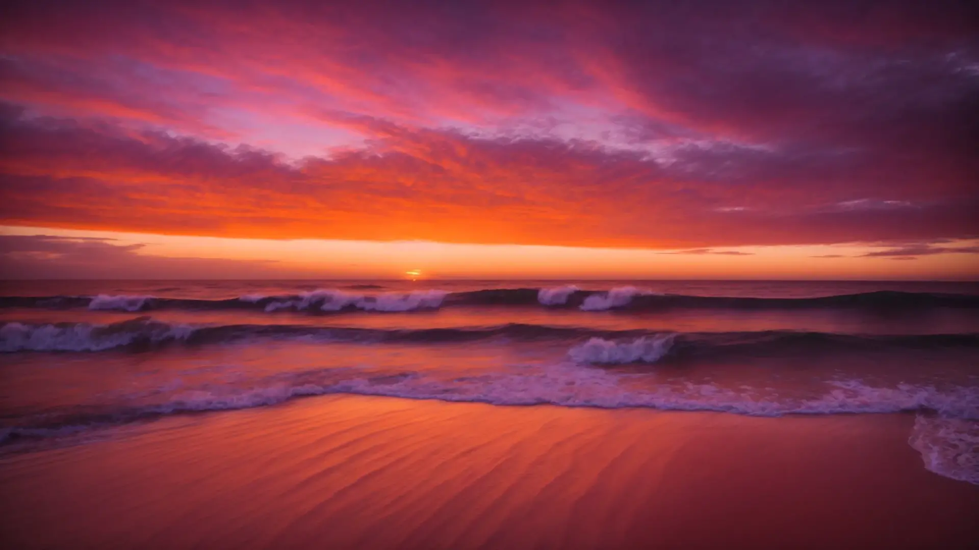 Breathtaking sunset over the ocean with vibrant purple and orange hues reflecting on the water, illustrating serene beauty and tranquility.